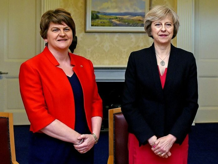 May under pressure to get DUP onside